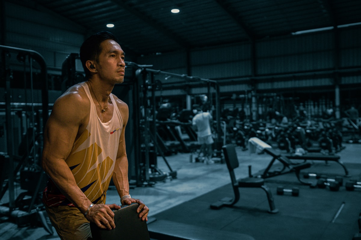 Modern man exercising and maintaining healthy weight through proper nutrition